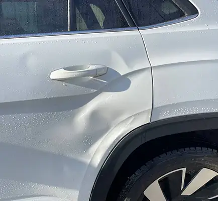 Extreme dent removal on vehicle with complex damage