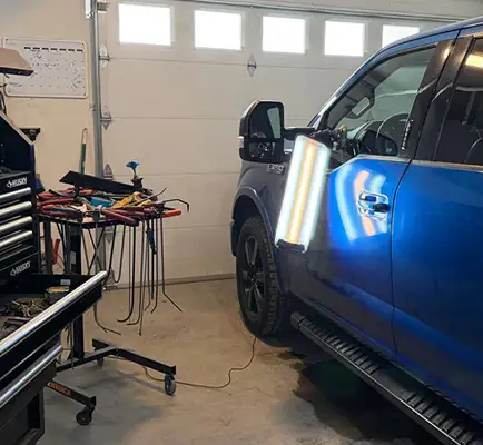 Mobile dent repair service arriving at customer location in Spokane County