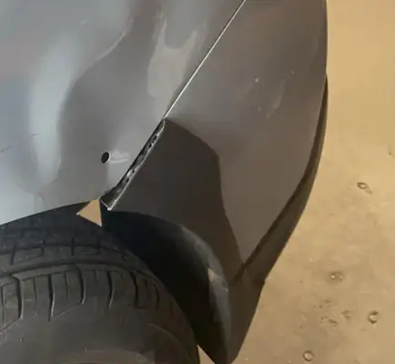 Plastic bumper dent repair using controlled heat reshaping